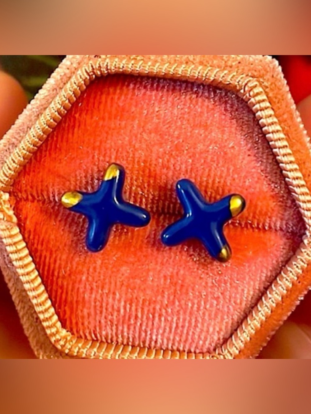 “ANTHROPOLOGY” PIERCED POST EARRINGS w/BLUE ENAMEL “X” and GOLD ON TIPS.